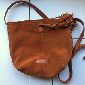 Woman’s lucky brand purse